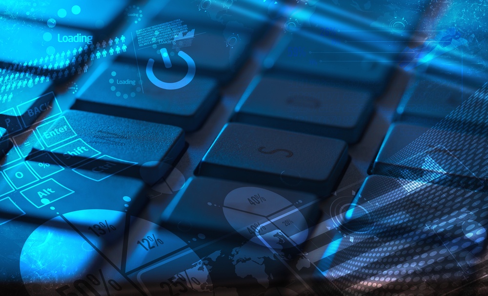 Computer keyboard with glowing charts, digital marketing concept